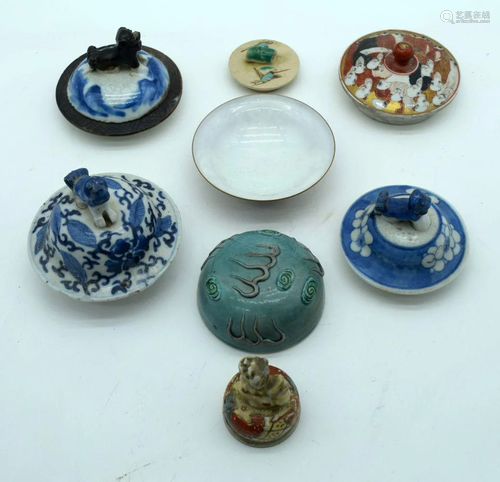 A collection of Chinese and Japanese Pot lids and a