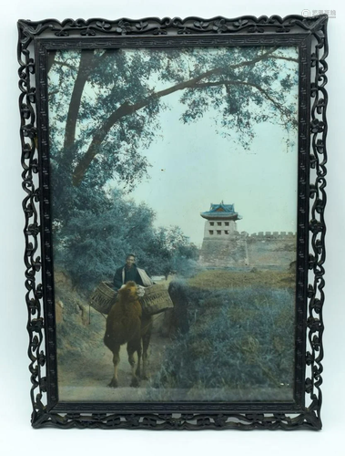 A framed photograph of a Chinese man 43 x 31cm.