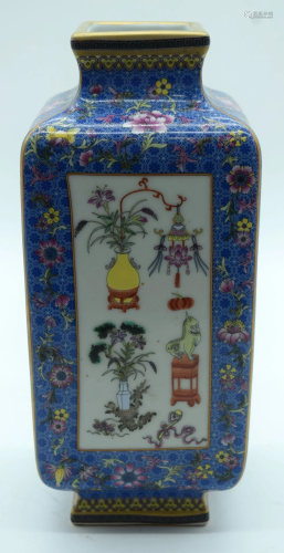 A Chinese porcelain Kong vase decorated with flowers