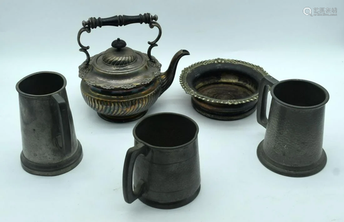 An embossed silver plate tea pot , dish and three