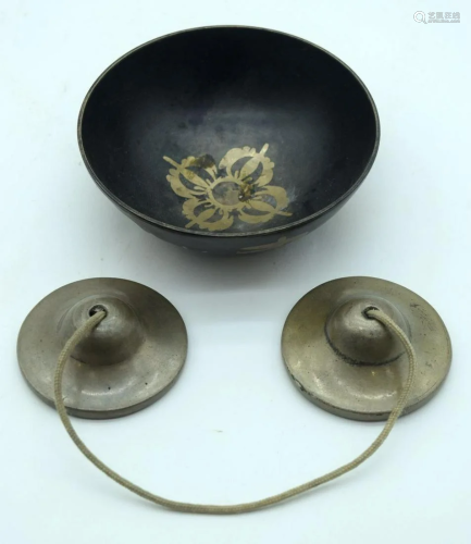 A pair of Tibetan Tingsha bells and a small singing