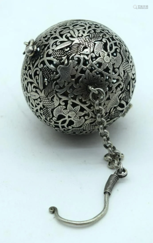 A Chinese white metal open work incense burner 6cm.