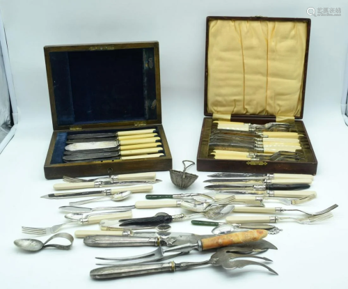 A collection of boxed plated bone handled