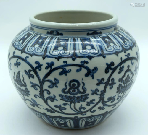 A Chinese blue and white vase decorated with Lotus 19 x