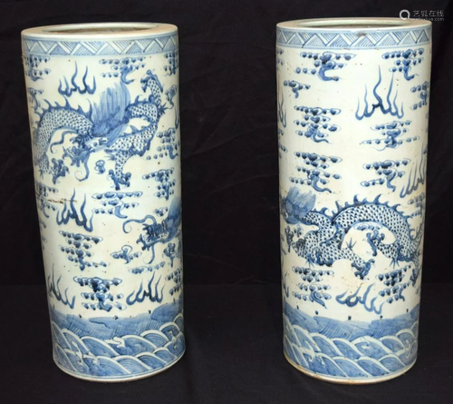 A pair of Chinese blue and white planters decorated