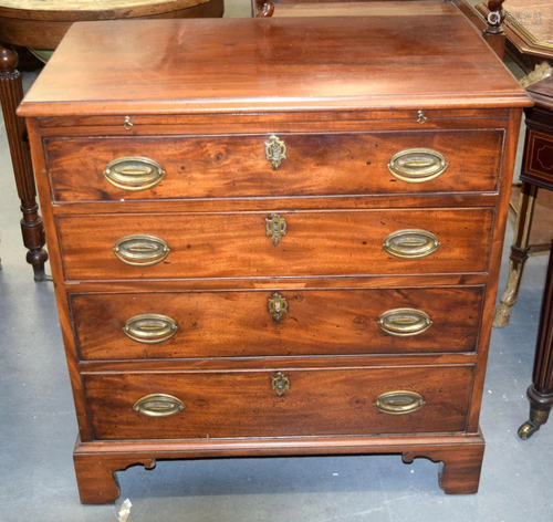 A GEORGE III MAHOGANY CHEST OF DRAWERS with unusual