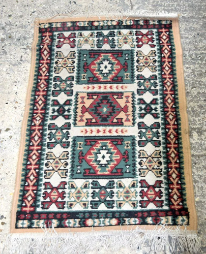 A small Persian rug 94 x 60cm.