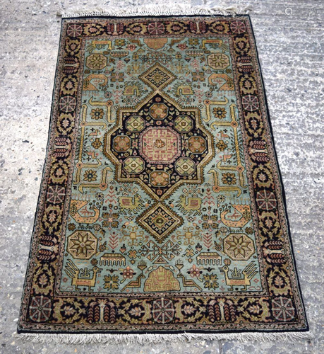 A Persian Silk rug 133 x 79cm.