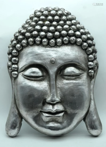 A large South East Asian head 60 x 39cm .