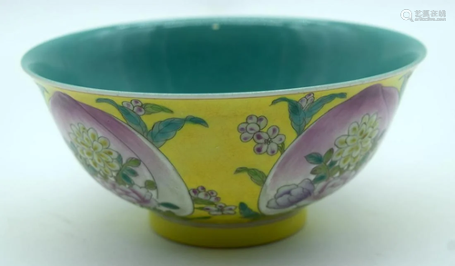 A Chinese yellow ground bowl with Famille Rose petal