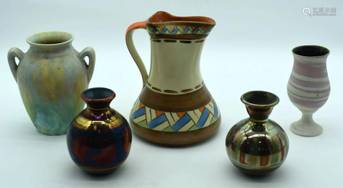 A collection of pottery jugs and vases including Myott