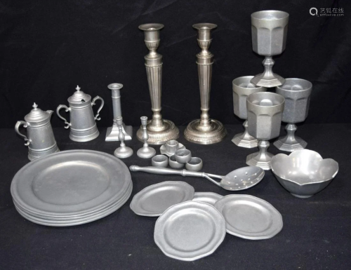 A collection of brushed metal and metal coated pottery