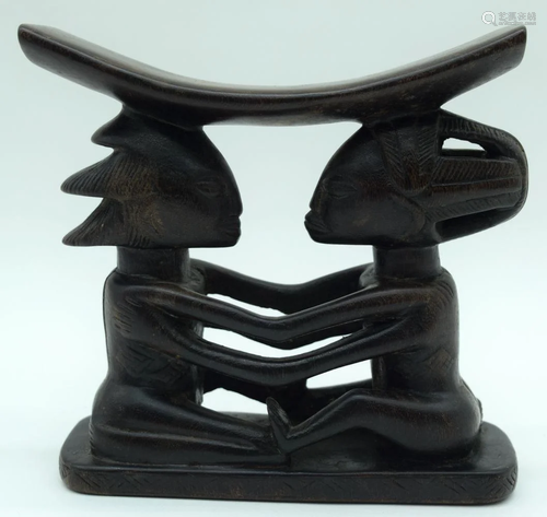 An African wooden Tribal head rest 18 x 18cm.