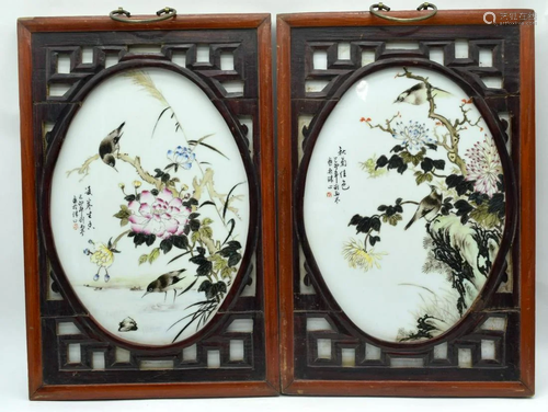 A pair of Chinese framed porcelain panels decorated