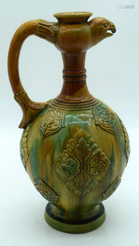 A Chinese wine vessel with a birds head handle 36 x