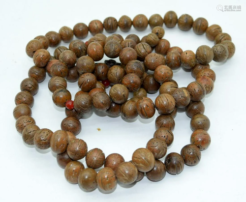 A Chinese Hedaio nut necklace 170cm .