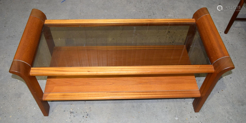 A Danish Teak coffee table with a glass top by Kvist.