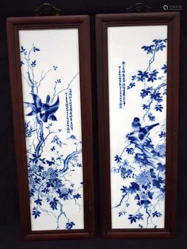 A pair of Chinese framed porcelain panels decorated