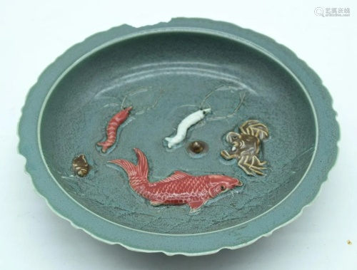 A Chinese bowl decorated with sea creatures. 22cm.