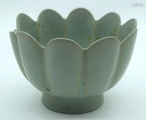 A Small Chinese Celadon petal shaped vase 10 x15 cm.