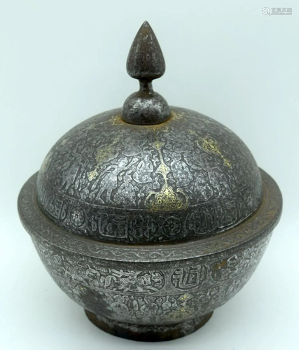 A 19th C Islamic iron box and cover decorated with