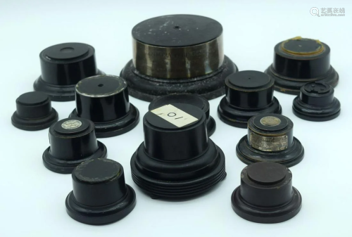 A group of vintage wooden and Bakelite trophy stands 16