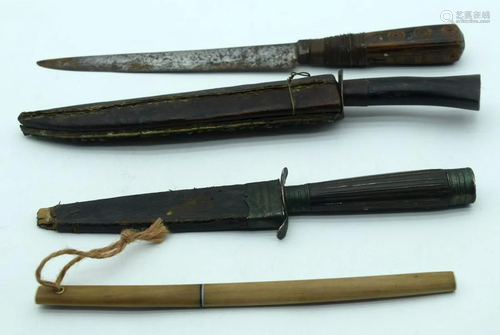 A south Asian Kukri in a leather and metal sheath