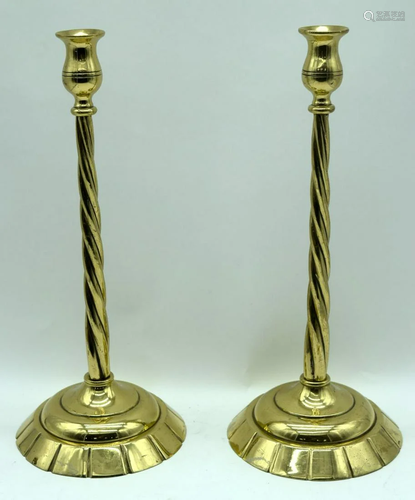 A pair of brass candlesticks . 43cm (2).