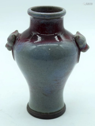 A Chinese Flambe glazed vase with Lion head handles