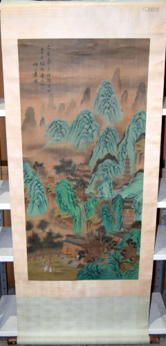 A Chinese Scroll painted with figures in a landscape