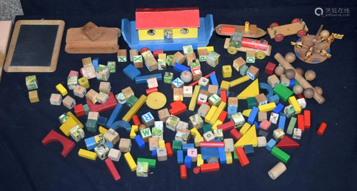 A collection of vintage wooden toys including an Noah's