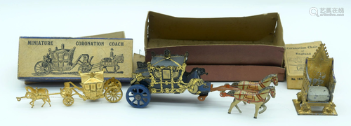 A vintage tin plate coronation Coach together with