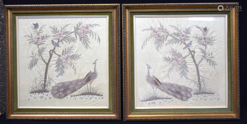 A pair of Framed Chinese silk panels depicting peacocks