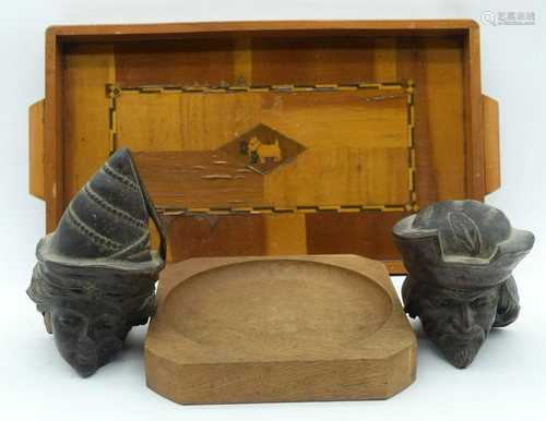 Two carved wooden heads together with a marquetry tray