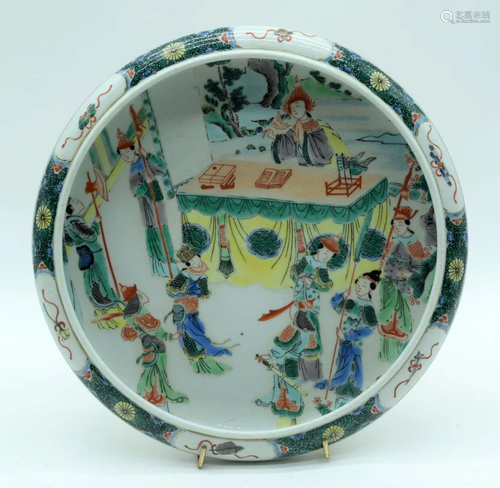 A Chinese Famille Verte dish decorated with figures