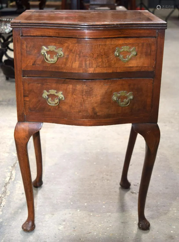 An Edwardian small two drawer cabinet with a walnut