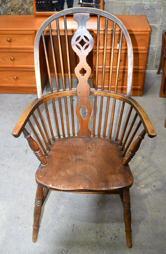 A large oak Winsor chair 111 x 63 cm .