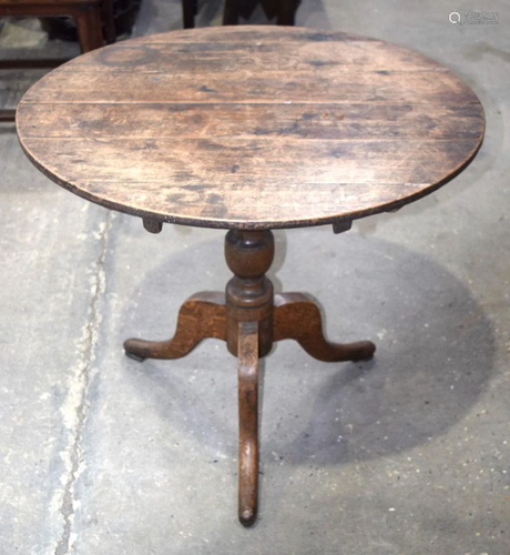 An Oak folding table 75 x 78 cm .