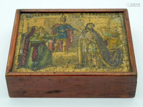A rare antique jigsaw puzzle on wooden cubes of