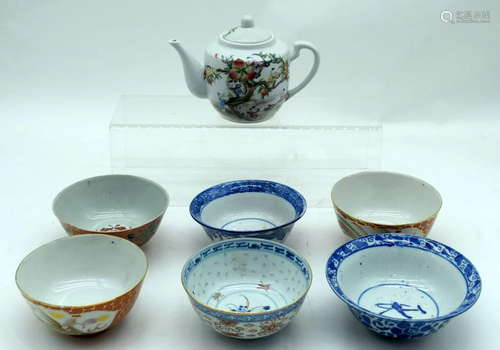 A collection of Chinese ceramic bowls and a tea pot 11