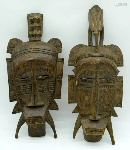 A pair of African masks 44cm . (2).