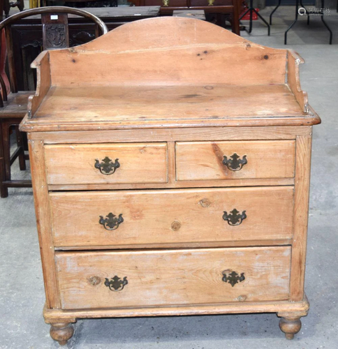 A four drawer pine chest 108 x 93 x 47cm .