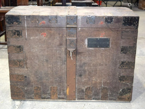 A large wooden metal banded chest 63 x 83 x 55cm.