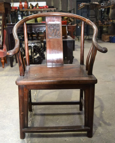 A Chinese hardwood chair with a carved back panel 97 x