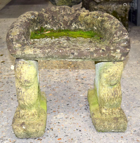 Two stone gargoyle statues with a concrete seat . 47 x