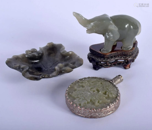 AN EARLY 20TH CENTURY CHINESE CARVED JADE ELEPHANT