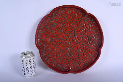 A 19TH CENTURY CHINESE CARVED TIXI LACQUER LOBED DISH