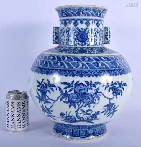 A LARGE CHINESE TWIN HANDLED BLUE AND WHITE PORCEL…