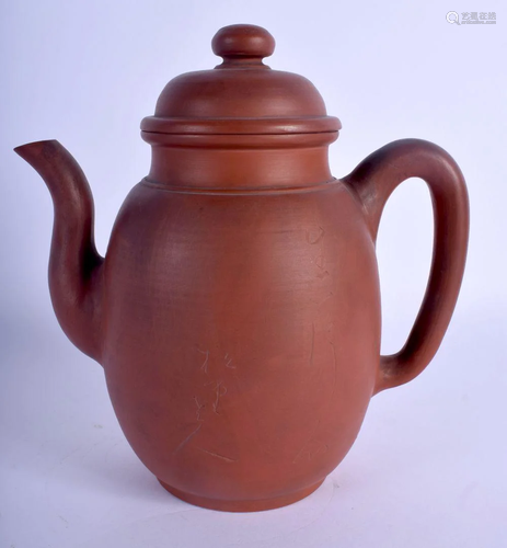 AN EARLY 20TH CENTURY CHINESE YIXING POTTERY TEAPOT A…