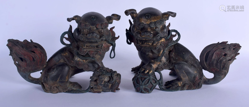 A PAIR OF CHINESE BRONZE FIGURES OF BUDDHISTIC LIONS